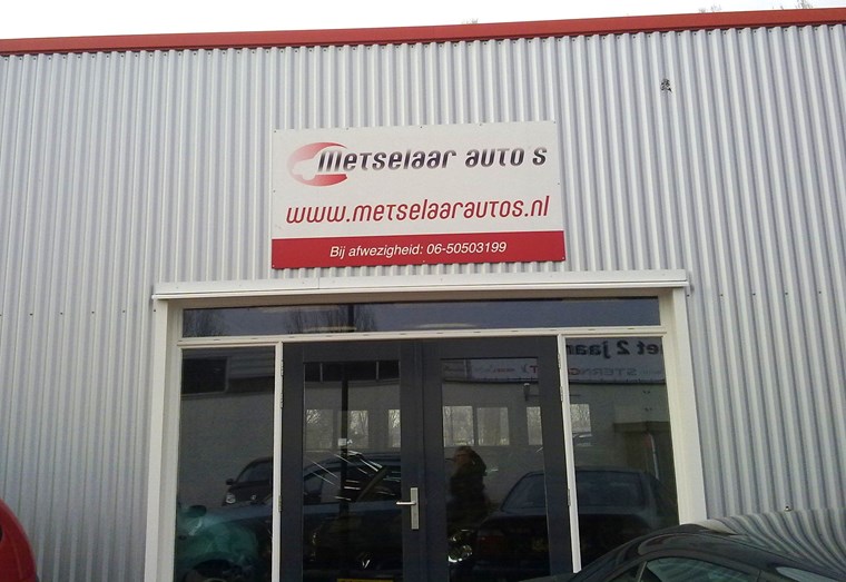 metselaar reklamebord pand